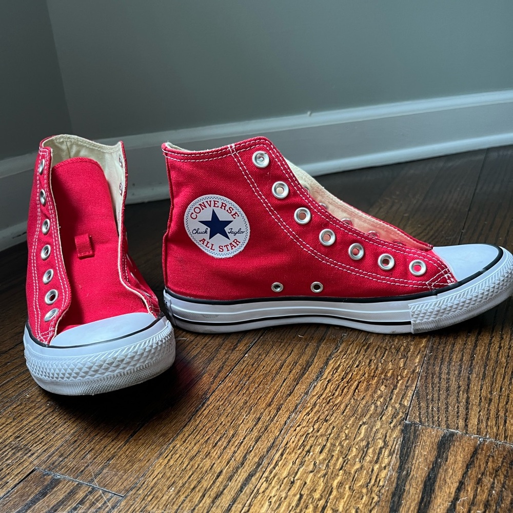 Women’s red Converse high tops, size 7